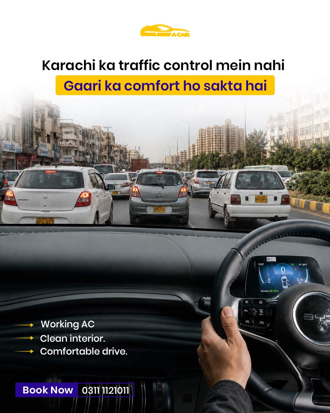 Driver's view of a clean car interior in Karachi traffic